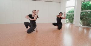 Image of two dancers in studio
