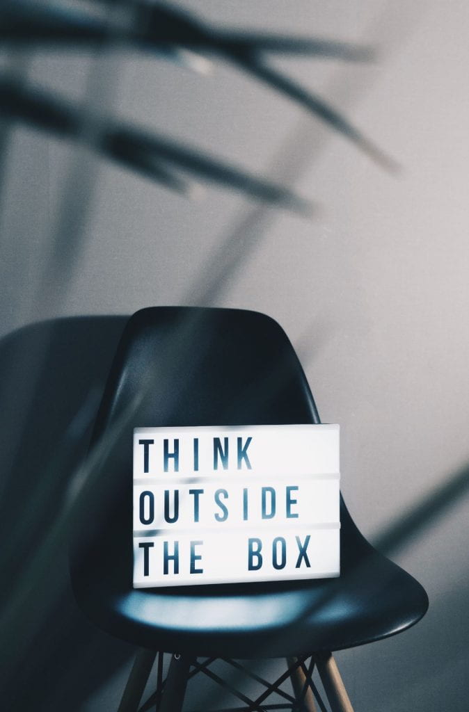 Light box with text saying "think outside the box"